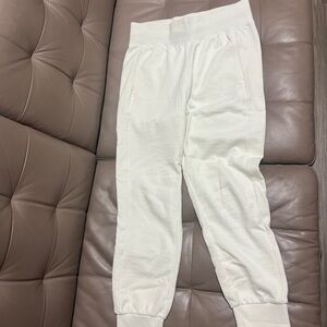Women’s Cream PUMA track pants size M